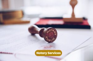 A legal document and a notary stamp shown to represent the notary services that PIllarstone Law provides.