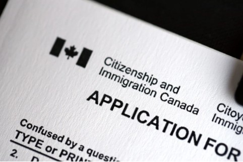 An image showing application paperwork to apply for status via Citizenship and Immigration Canada.